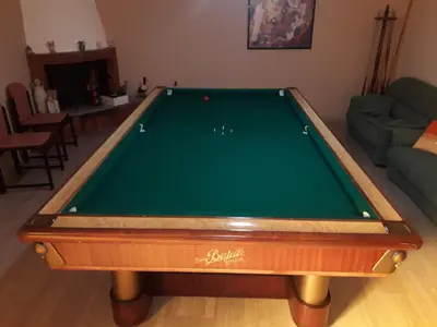 a green pool table in a living room at Elimo Affittacamere - Casa Vacanze di Scardino Leonardo in Poggioreale