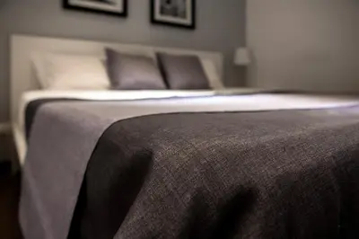 a close up of a bed in a bedroom at Palermo al Centro - Appartamento Maestri in Palermo