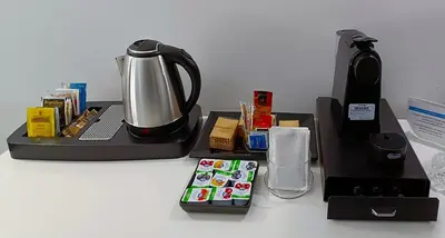 a coffee maker sitting on top of a table at Palermo al Centro - Appartamento Maestri in Palermo