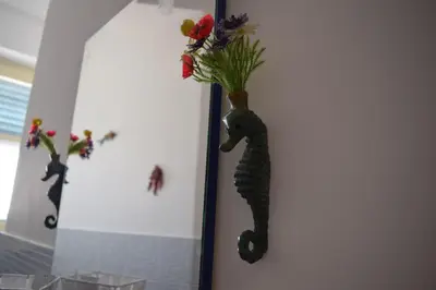 a seahorse decoration on the side of a wall at L'Aquilone B&B in Palermo