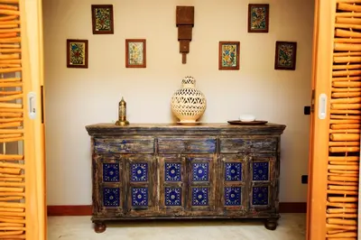 a vase on top of a wooden dresser in a room at Villa Sole in San Vito lo Capo