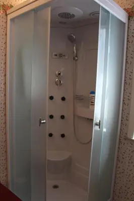 a bathroom with a shower with a toilet in it at B&B Pisani in Palermo