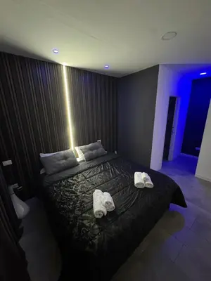 a bedroom with a bed with towels on it at Ri.Mo's Rent Room in Palermo