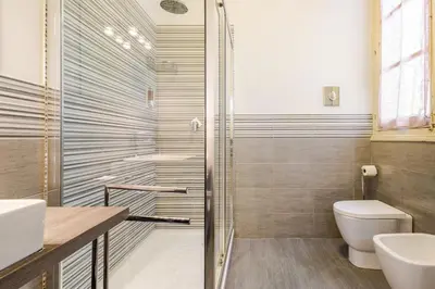 a bathroom with a shower and a toilet at Bilocale in Centro in Palermo