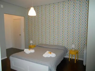a bedroom with a bed with towels on it at Zammù in Palermo