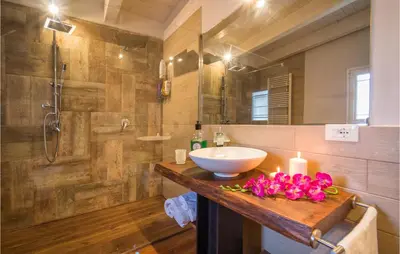 a bathroom with a sink and a shower at Palermo Per Due in Torretta