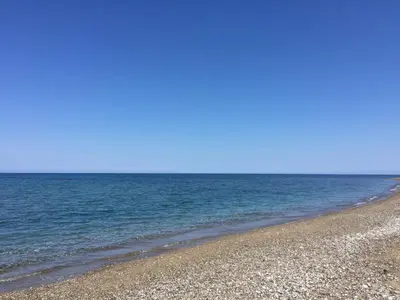 a beach with the ocean in the background at Casa Vacanze Astori in Trabia