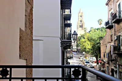 a view of a city street from a balcony at La Casetta di Clara in Palermo