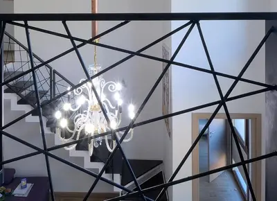 a rendering of a chandelier in a room at Alla Corte Maqueda in Palermo