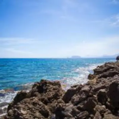a view of the ocean from a rocky beach at Villa sul mare in Palermo