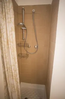 a shower in a bathroom with a shower curtain at Villa sul mare in Palermo