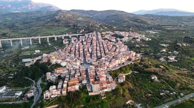 an aerial view of a city with a bridge at L'angolo di Rosa in Campofelice di Roccella