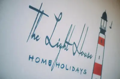 a piece of paper with a drawing of a lighthouse at The Lighthouse in Trappeto