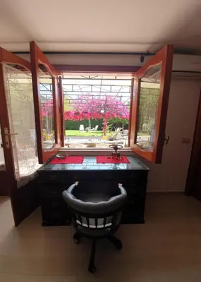a bathroom with a sink and a window at La depandance di Villa Rosa locazioni brevi in Mondello