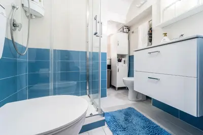 a bathroom with a toilet and a shower at Casa di Cecilia in Castellammare del Golfo