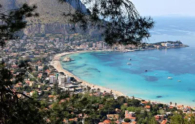 a view of a beach with boats in the water at Il Sonaglio in Palermo