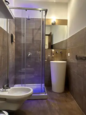 a bathroom with a shower and a sink at Marilù in Palermo
