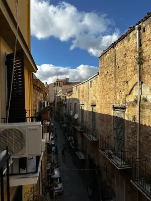 a view of an alley with buildings and a street at Marilù in Palermo