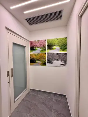 a hallway with two paintings on the wall at Le Quattro Stagioni - Rooms & Suites in Palermo