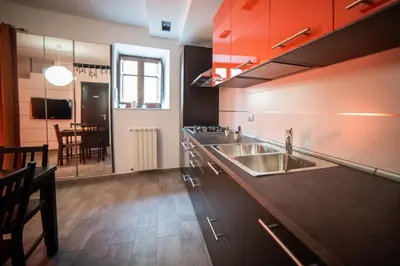 a kitchen with a sink and a counter top at Casa degli Artisti San Lorenzo in Mezzojuso