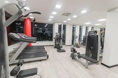 a gym with treadmills and elliptical machines at Casa degli Artisti San Lorenzo in Mezzojuso