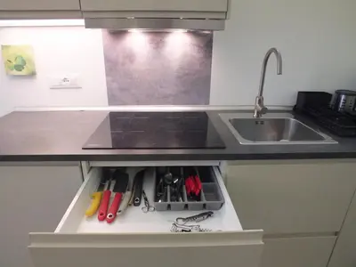 a kitchen with a sink and a counter top at Re Federico Apartment in Palermo