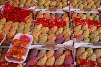 a display of different types of fruit in boxes at Luxury Apartment * Immo's House* in Palermo