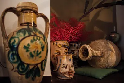 a group of vases and a jar on a table at Atmosfere Puniche b&b in Palermo
