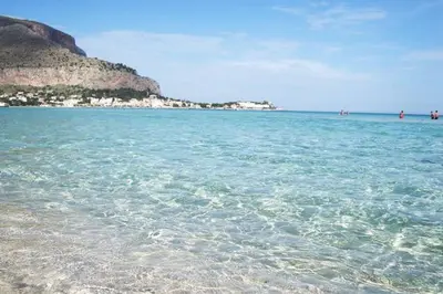 a view of the ocean from the shore of a beach at Casa Frida in Palermo