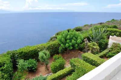 an aerial view of a garden with the ocean at Villa Linda, Exceptional Sea-view in Terrasini