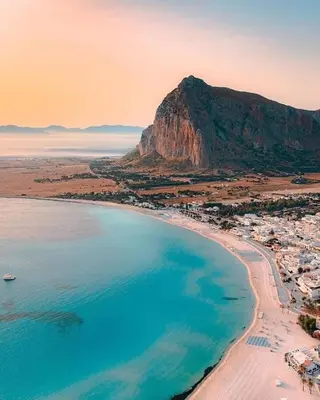 an aerial view of a beach with a mountain at Le Case di Palma - Viola in San Vito lo Capo