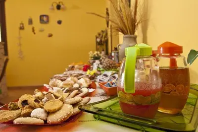 a table with a plate of food and a drink at ilgiardinodellanonna in Castelluzzo