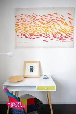 a white desk with a picture on the wall at APT Ballarò House - Superior Apartment in Palermo
