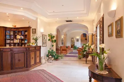 a large living room with a couch and a table at Torre Bennistra in Scopello