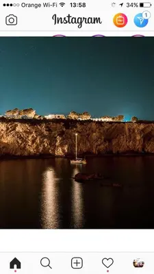 a group of people in the water at a beach at Apartment in the center in Terrasini