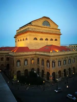 a large building with a large red roof at Al Massimo 36 in Palermo