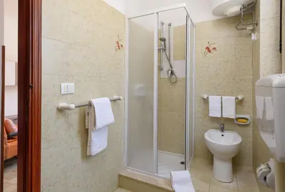 a bathroom with a shower and a toilet at Casa Vacanza Azzurra 3 in San Vito lo Capo