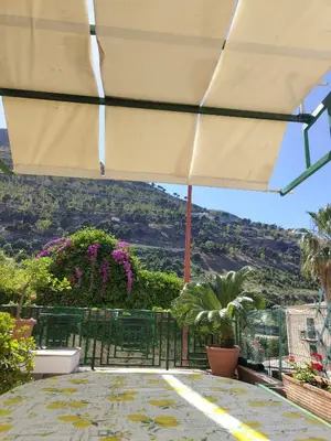 a patio with a view of a mountain at Marina in Castellammare del Golfo