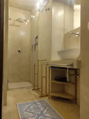 a bathroom with a sink and a shower at Marina in Castellammare del Golfo