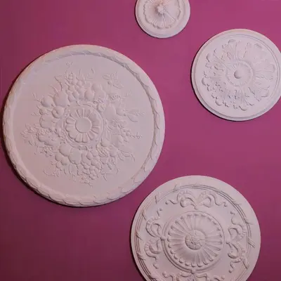 a group of white plates on a purple table at Il Rosone Luxury B&B in Palermo