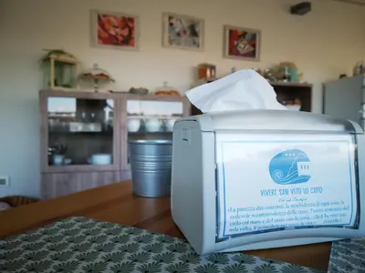 a container of mercy can you do up sitting on a table at B&B Vivere San Vito Lo Capo in San Vito lo Capo