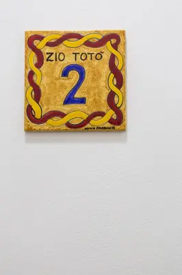 a sign on a wall that says zoo at dallo Zio Totò in Palermo