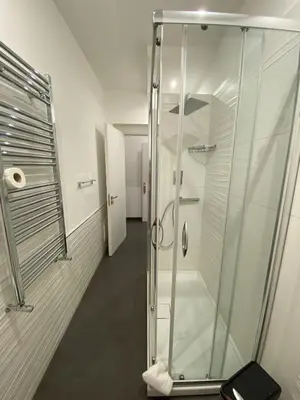 a glass shower in a bathroom with at Amuri Room&Suite in Palermo