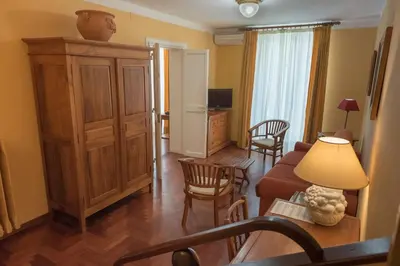 a living room with a couch and a table at palazzo pantaleo in Palermo