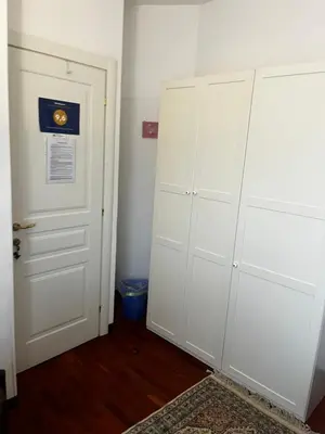 a room with a white closet and a door at Incantevole E A Due Passi Dal Centro in Palermo