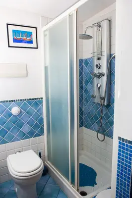 a bathroom with a toilet and a shower at Incantevole E A Due Passi Dal Centro in Palermo
