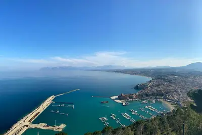 an aerial view of a harbor with boats in the water at Casa vacanze Al porticciolo romantico in Trappeto