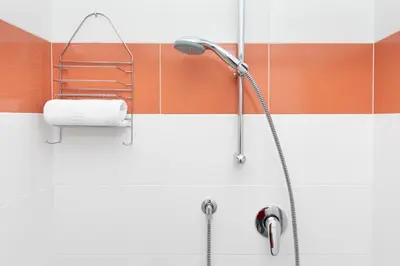 a shower with a shower head in a bathroom at Fuga Romantica vicino al Mare - Rental BeB in Balestrate