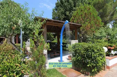 a gazebo with a water fountain in a garden at VILLASEASICILY , POOL SALT WATER and NATURAL CHLORINE IN BALESTRATE - PALERMO in Balestrate