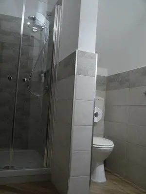 a bathroom with a shower and a toilet at A Vanedda in Termini Imerese